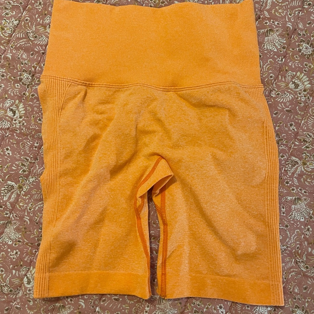 Orange seamless workout shorts